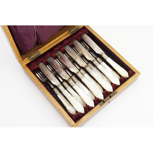 89 - A Cased Set of 6 of 6 Each Mother of Pearl Handled Desert Knives & Forks in an Original Case.