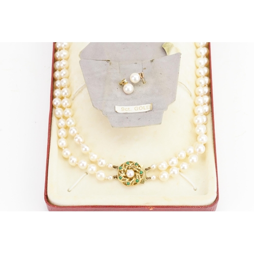 227 - A 9ct set of pearls and diamond earrings.