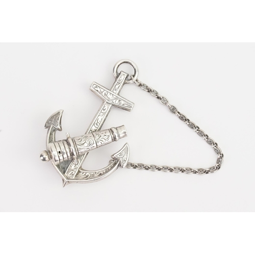 228 - An interesting Silver Cannon and anchor brooch, with chain decoration. Size 6.3cm x 4cm. Weight 11.9... 