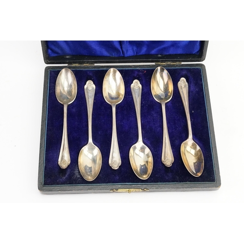 41 - A Cased Set of Silver Tea Spoons.