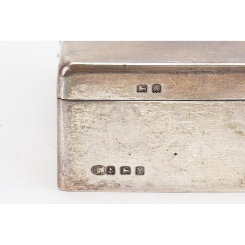 53 - A Birmingham 1947 Silver cigarette box. Maker Alexandra Clarke & Co. Weight 368g.