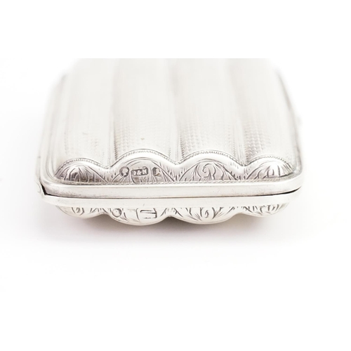 81 - A Victorian Silver Four Division Cigar Case with engine turned decoration. Weighing: 85 grams.