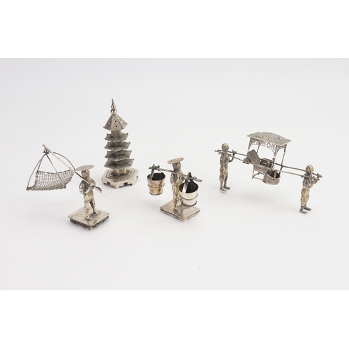 747 - A Chinese Silver Pepperette designed as a Pagoda along with three similar figures of a Palanquin car... 