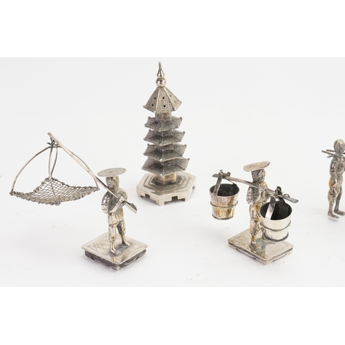 747 - A Chinese Silver Pepperette designed as a Pagoda along with three similar figures of a Palanquin car... 