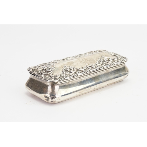 69 - A Silver Oblong Dressing Table Box with embossed decoration. Weighing: 102 grams.