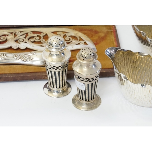 72 - A Pair of Silver Peppers with pierced decoration & Blue Glass Liners, a Sugar & Cream & a Fish Set.