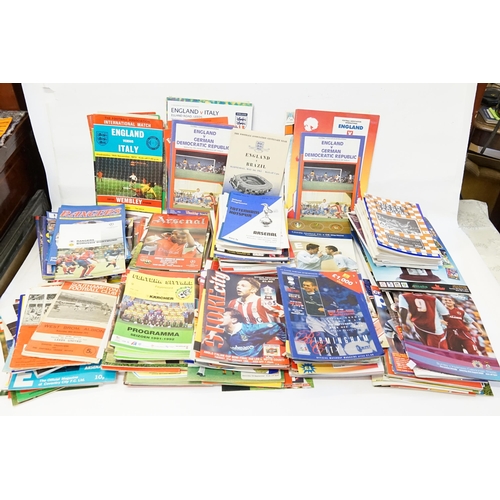 1099 - A Large Collection of Original Football League Programmes to incude England, Arsenal, Tottenham Hots... 