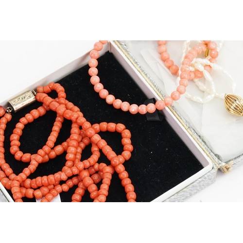 230 - A Pink Coral Necklace with Gold mount, one other & a 'Pearl' Necklace.