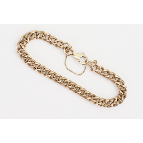 231 - A 9ct Gold Engraved Link Chain Bracelet with Safety Chain. Weighing: 10.2 grams.