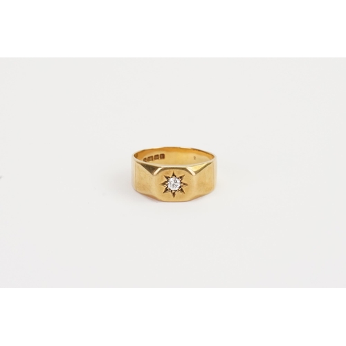 140 - A 18ct Gold diamond set signet ring. Weight 8g. Size R.