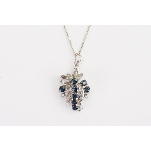 146 - A Silver Sapphire and paste necklace, hung on Silver chain. Weight: 5.8grams.