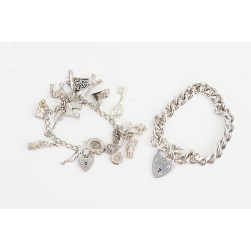 149 - A Silver charm bracelet, along with one other Silver padlock bracelet. Weight 74g.