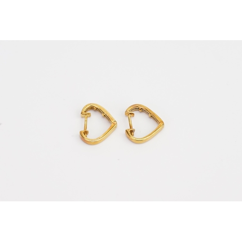 157 - A 18ct Gold pair of Diamond set earrings. Weight 3g.