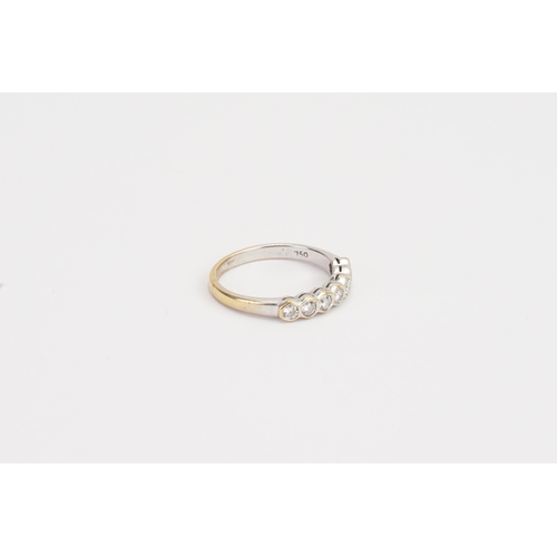 176 - A 18ct yellow & white gold half hoop diamond set ring. Weight 3g. Size N. 0.07ct each.