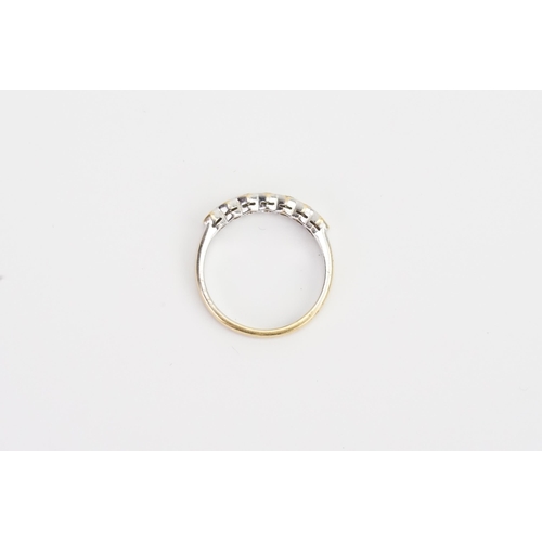 176 - A 18ct yellow & white gold half hoop diamond set ring. Weight 3g. Size N. 0.07ct each.