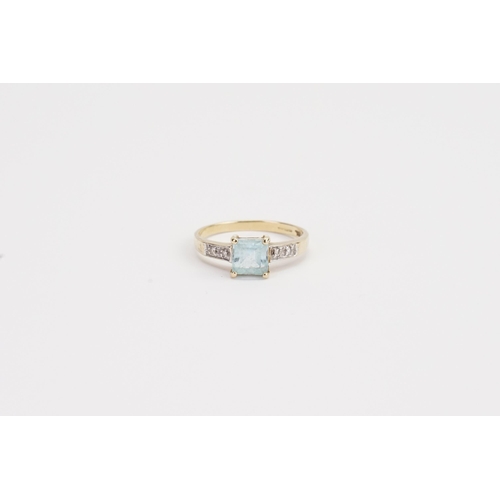 177 - A 9ct Gold Aquamarine and diamond set ring, in a raised setting. Aquamarine size approx. P. Weight 2... 