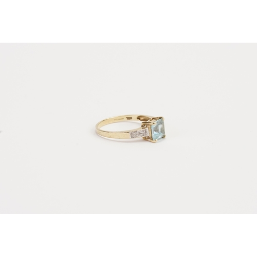 177 - A 9ct Gold Aquamarine and diamond set ring, in a raised setting. Aquamarine size approx. P. Weight 2... 