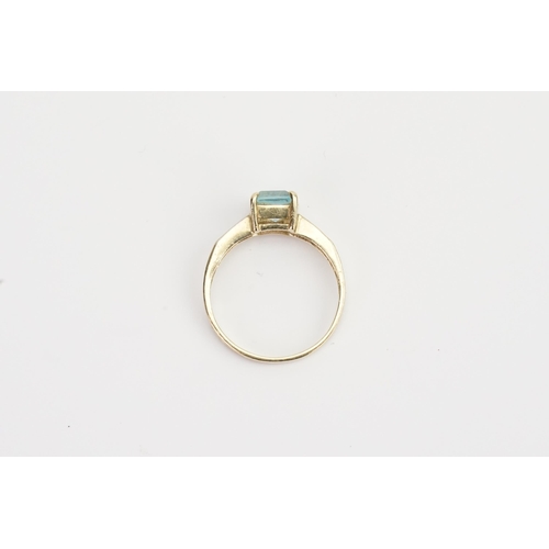 177 - A 9ct Gold Aquamarine and diamond set ring, in a raised setting. Aquamarine size approx. P. Weight 2... 