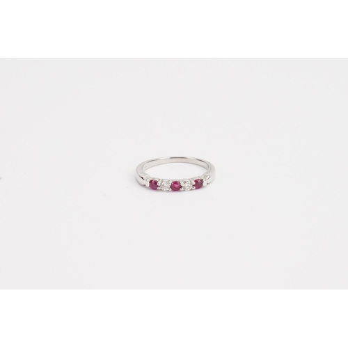 178 - A 9ct white Gold Ruby and diamond ring. Weight 1.8g. Size K.