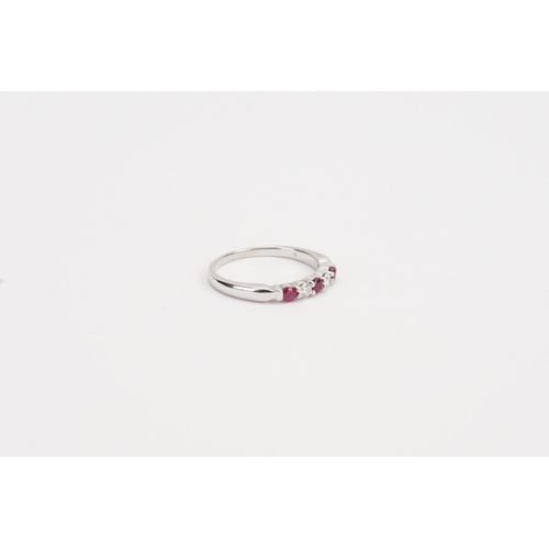 178 - A 9ct white Gold Ruby and diamond ring. Weight 1.8g. Size K.