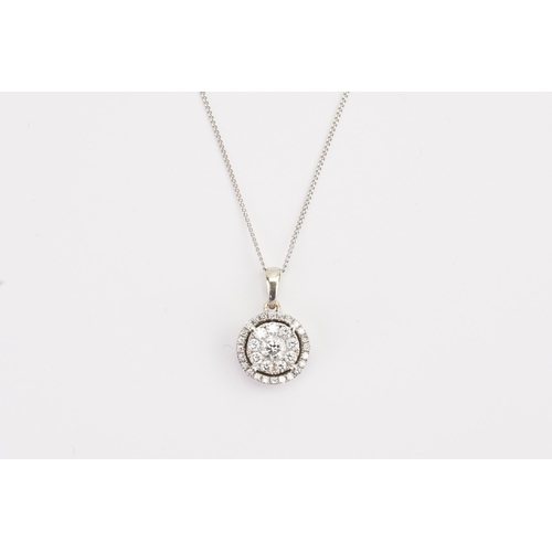 179 - A 9ct white Gold chain, hung with a 9ct Diamond pendant. In the cluster design. Largest Diamond 0.91... 