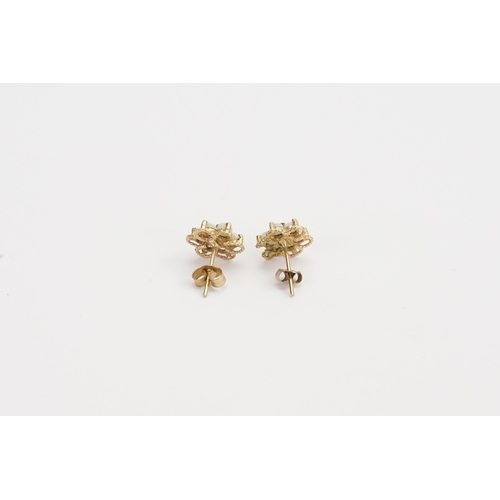 180 - A pair of 9ct Gold Opal earrings. Weight 1.1g.