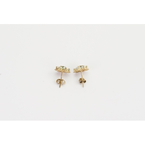 180 - A pair of 9ct Gold Opal earrings. Weight 1.1g.