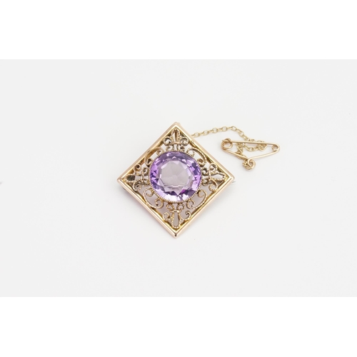 113 - A 9ct yellow gold Amethyst brooch converted from a pendant, set with a large Amethyst. Size 14mm dia... 