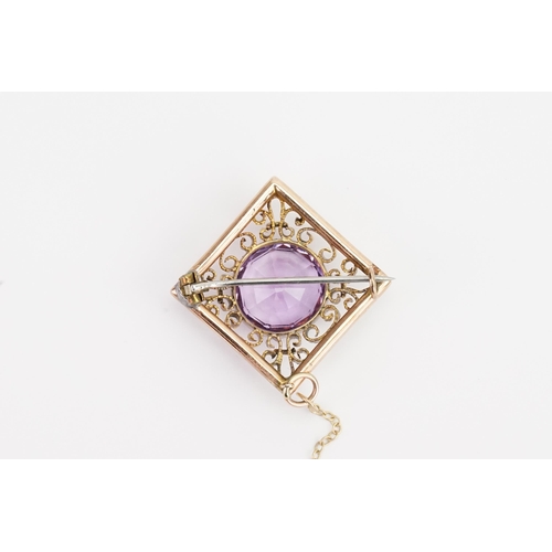 113 - A 9ct yellow gold Amethyst brooch converted from a pendant, set with a large Amethyst. Size 14mm dia... 