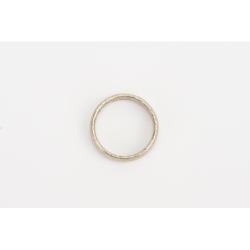 214 - A 18ct white Gold wedding band. Weight 6.5g. Size Q.