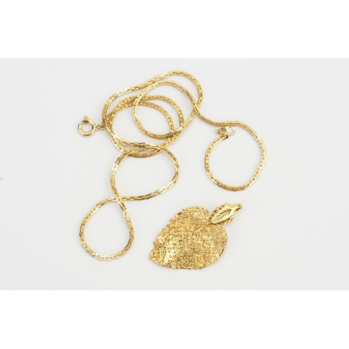 221 - A Gold coloured Leaf Pendant on a Gold coloured Chain. Pendant Weight: 1.6 grams.