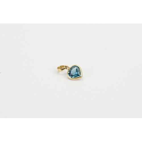 222 - A Blue Stone (Tests as Sapphire) Love Heart Pendant set in a Gold coloured setting. Weighing: 0.8 gr... 