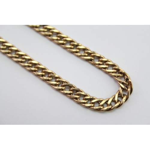 185 - An Italian 9ct Gold curb link necklace. Weighing approximately 8.5g. Length approximately 51cms.