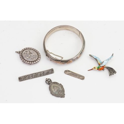 196 - A Silver Locket, an Enamelled Brooch & a Fillagree Brooch & a Gold overlaid Bangle.