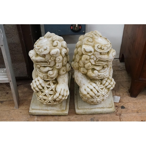 1062 - A Pair of Reconstituted Stone 