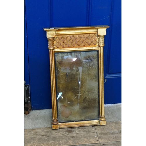 817 - A Regency period Looking Glass with side Columns & Diaper. Measuring: 34cms across x 57cms high.