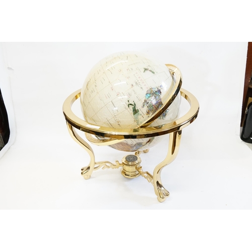 720 - A Modern Semi-Precious Stone inlaid Globe on a Gimbled Brass Stand.