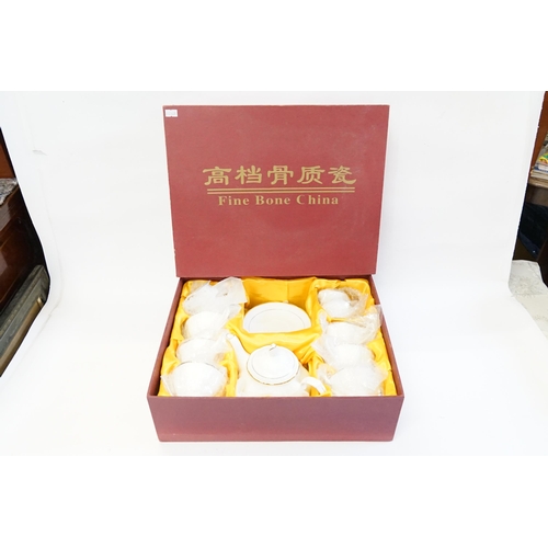 1044 - A Boxed Unused Vintage Chinese Tea Set in White & Gold made by 