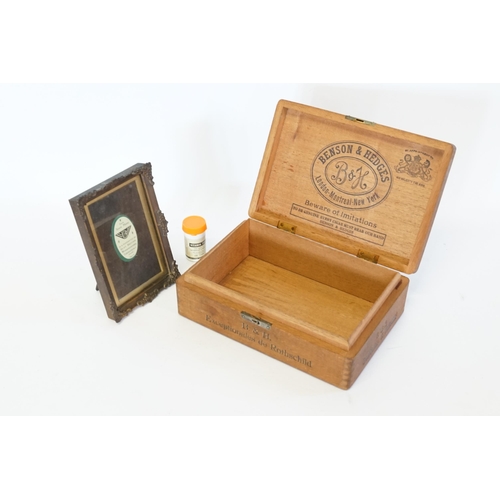 799 - A collection of 12 sixpences along with Benson & Hedges box, and a photo frame.