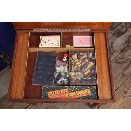 1105 - A 1960s/1970s Games Table in Mahogany containing Chess, Draughts, Playing Cards, etc. Measuring: 44c... 