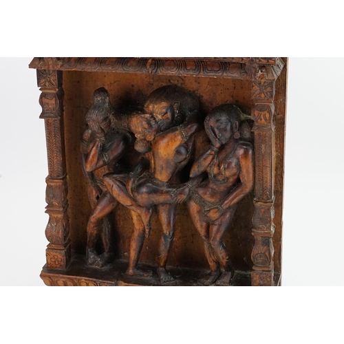 730 - An Indian Carved Erotic Panel depicting a couple in amorous pursuit & two embarrassed Onlookers. Mea... 