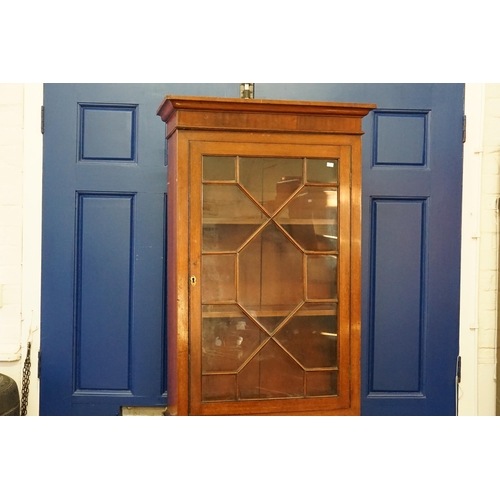 649 - An Edwardian design Astragal Glazed Topped Single Doored Tall Bookcase resting on Bracket Feet with ... 