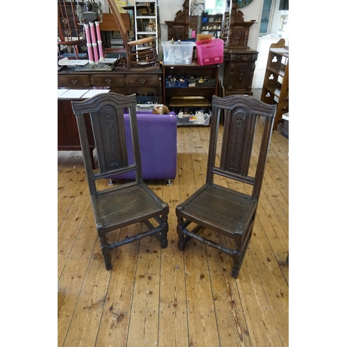 637 - A pair of antique oak side chairs, with carved back and turned legs, stretchers, with a good colour.