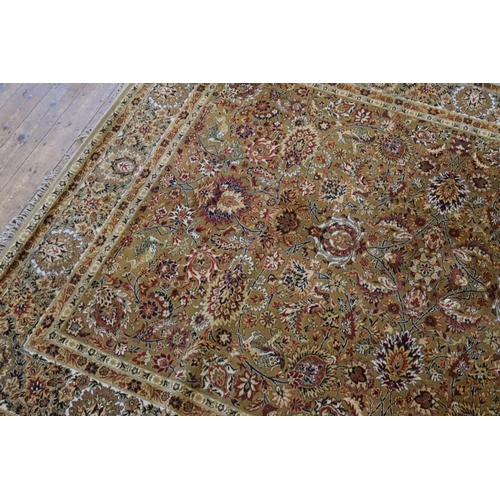 667 - An Olive Green Ground Double Floral bordered & Four Gul Central Medallion Carpet. Measuring: 360cms ... 