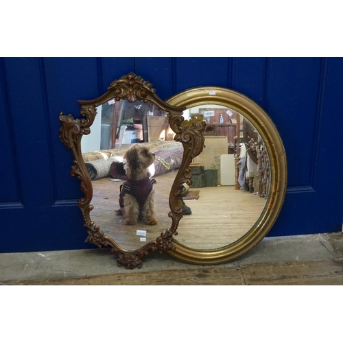 815 - A Rococo Framed Wall Mirror & one other in an Oval Frame.