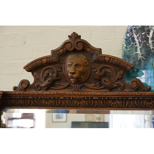 640 - A Victorian Heavily Carved Oak Revival Style Sideboard decorated with Game, Birds, a Carved Lion Mas... 