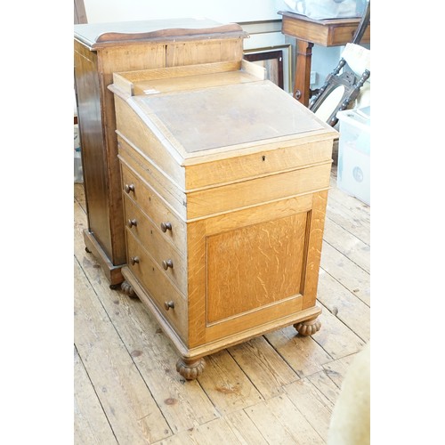 645 - An Edwardian Oak Davenport with a Sliding Top, Graduated Drawers, Pull-Out ink Drawer & a Tray Back.... 