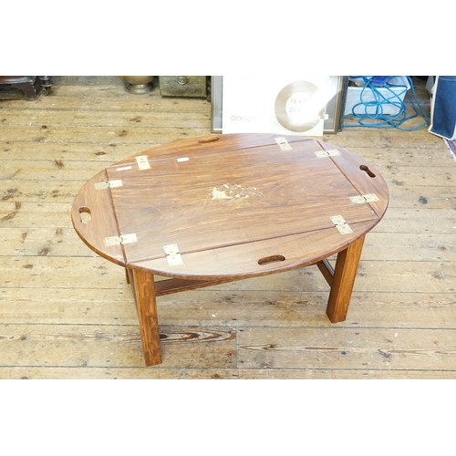 623 - An Indian Hardwood Butlers Tray/Coffee Table resting on square legs.