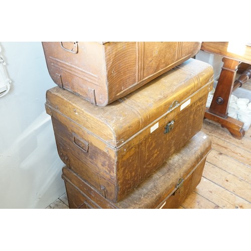 614 - A Set of Three Tin Brown Painted Victorian Trunks which fit inside each other. The Largest Trunk Mea... 