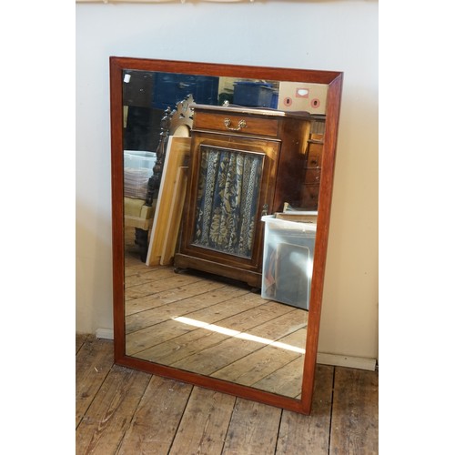 820 - A Modern Mirror in a Mahogany Frame. Measuring: 69cms x 102cms.